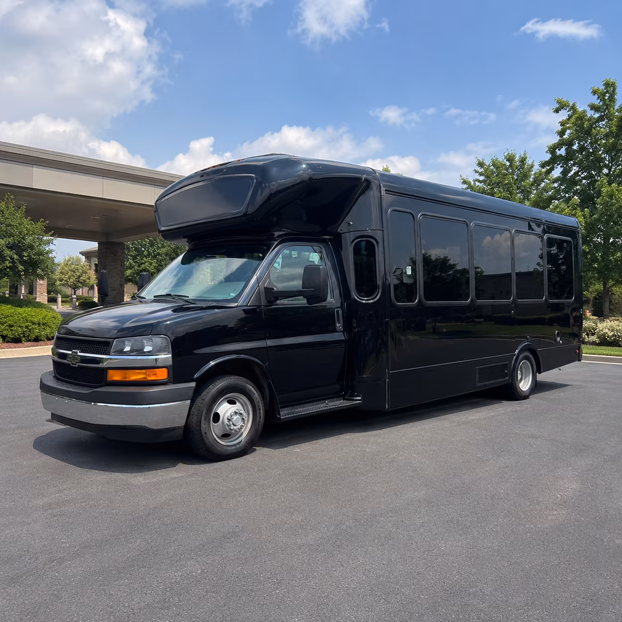 Group beside a Mercedes Sprinter limo in Newark